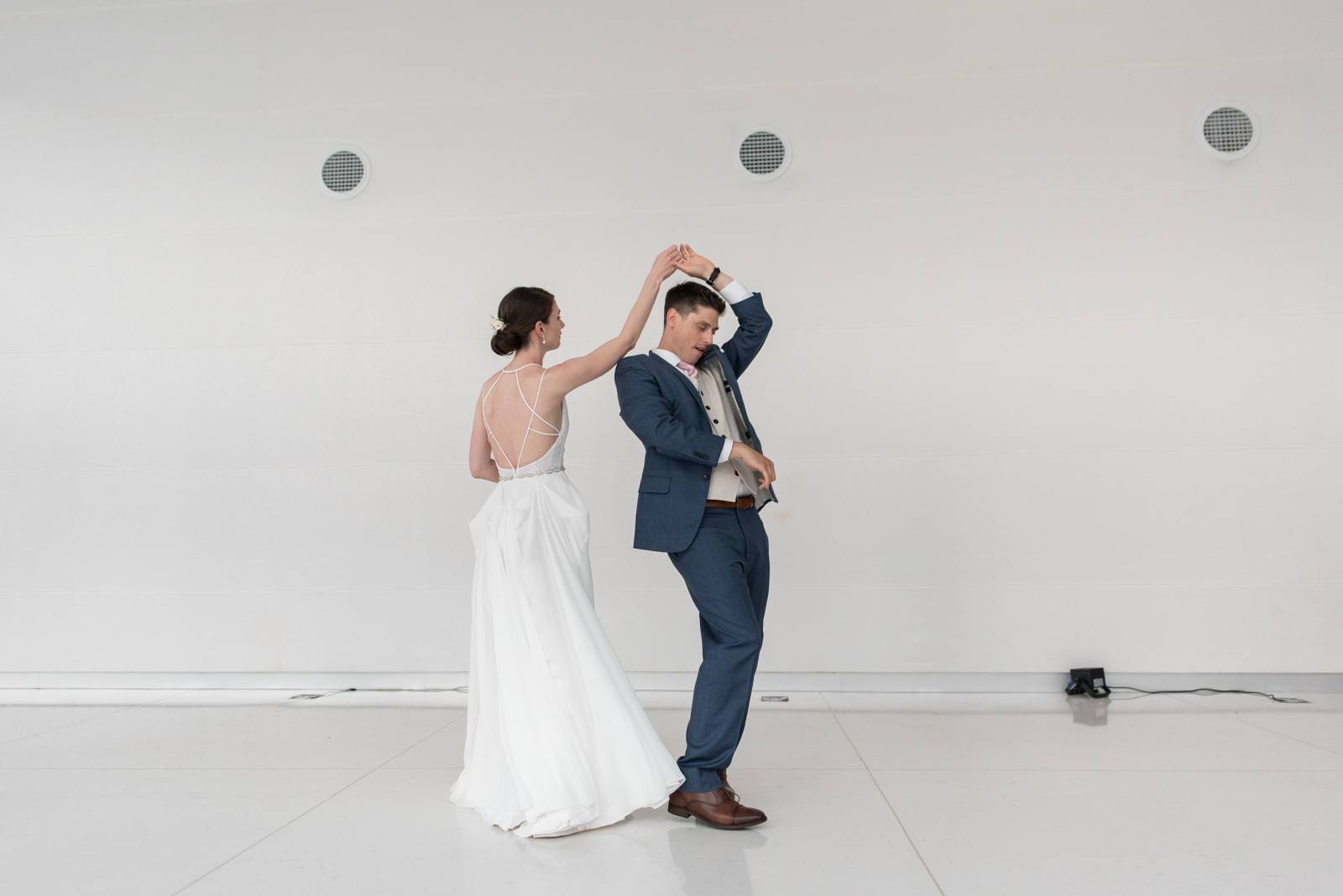 bride and groom dancing