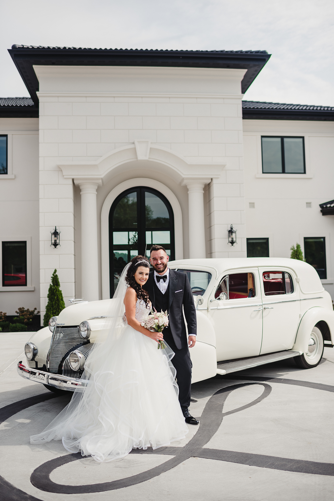 Luxury Bride and Groom with Vintage Car