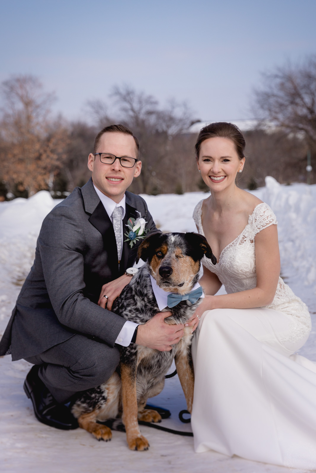 Winter Wedding Couple With a Dog