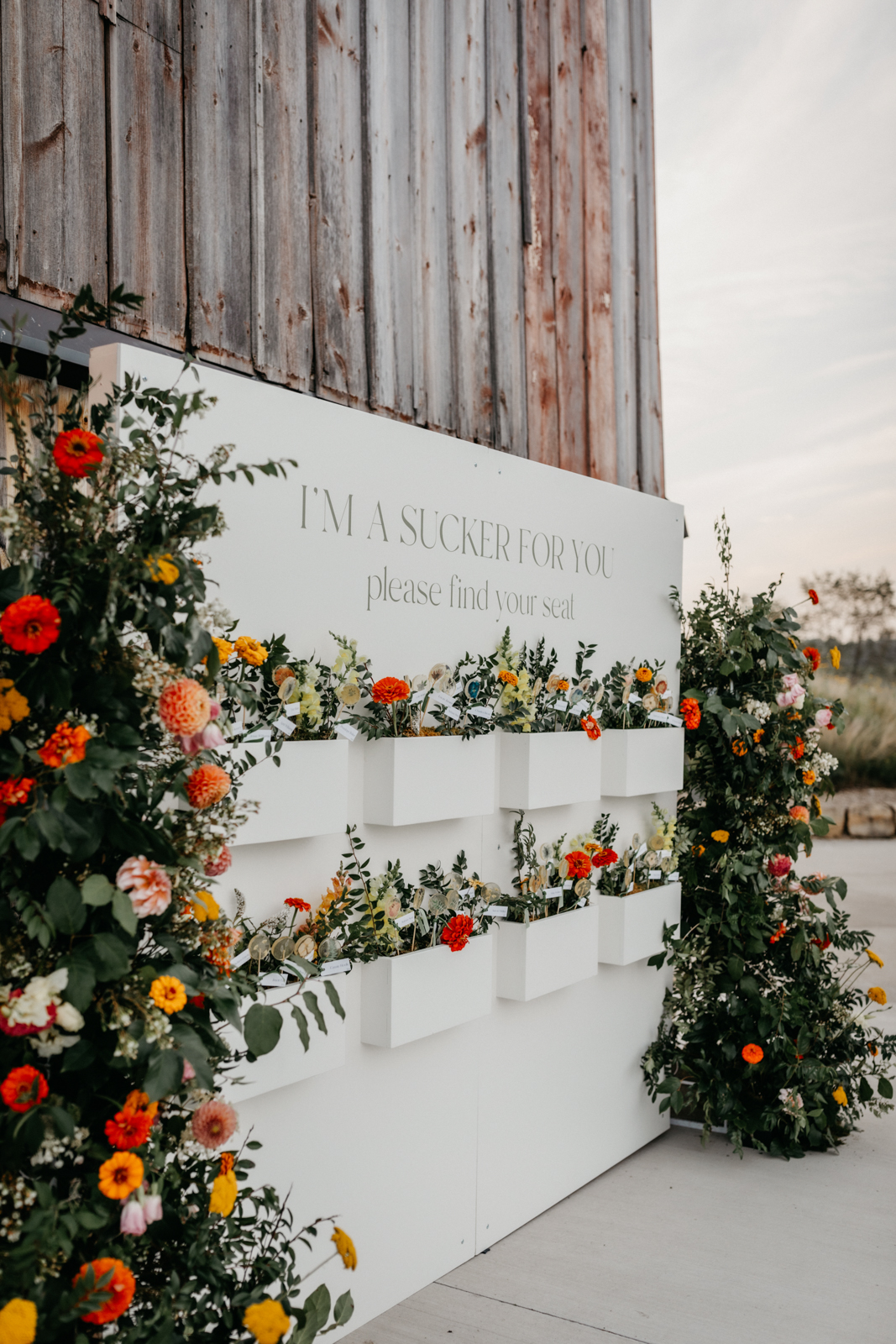 Luxurious Seating Chart Flower Favor Wall