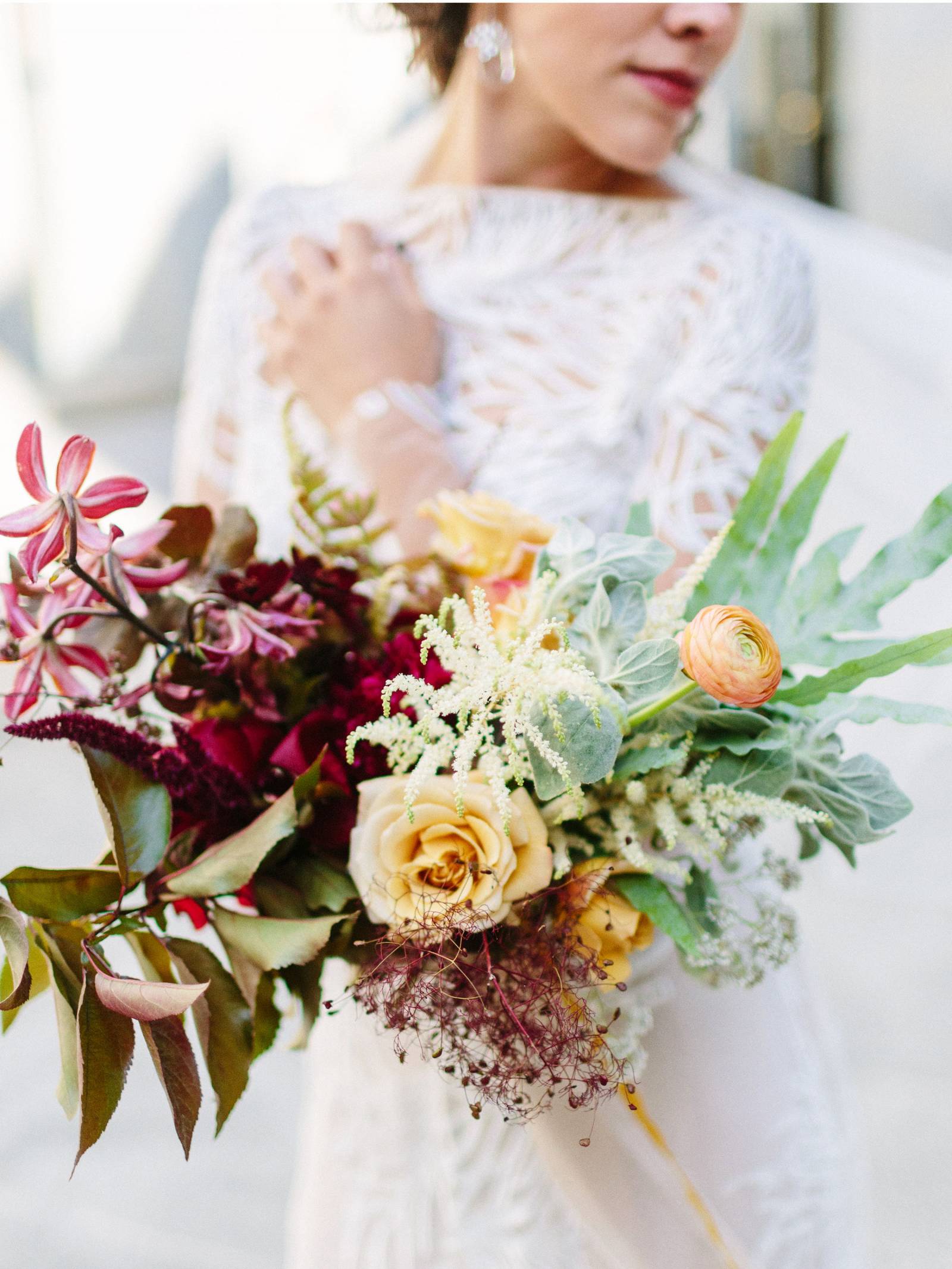 Multi-color bouquet with burgundy, yellow and mint green flowers