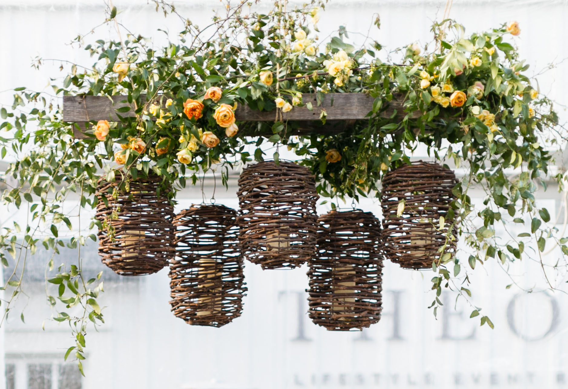 Hanging florals and wicker lanterns