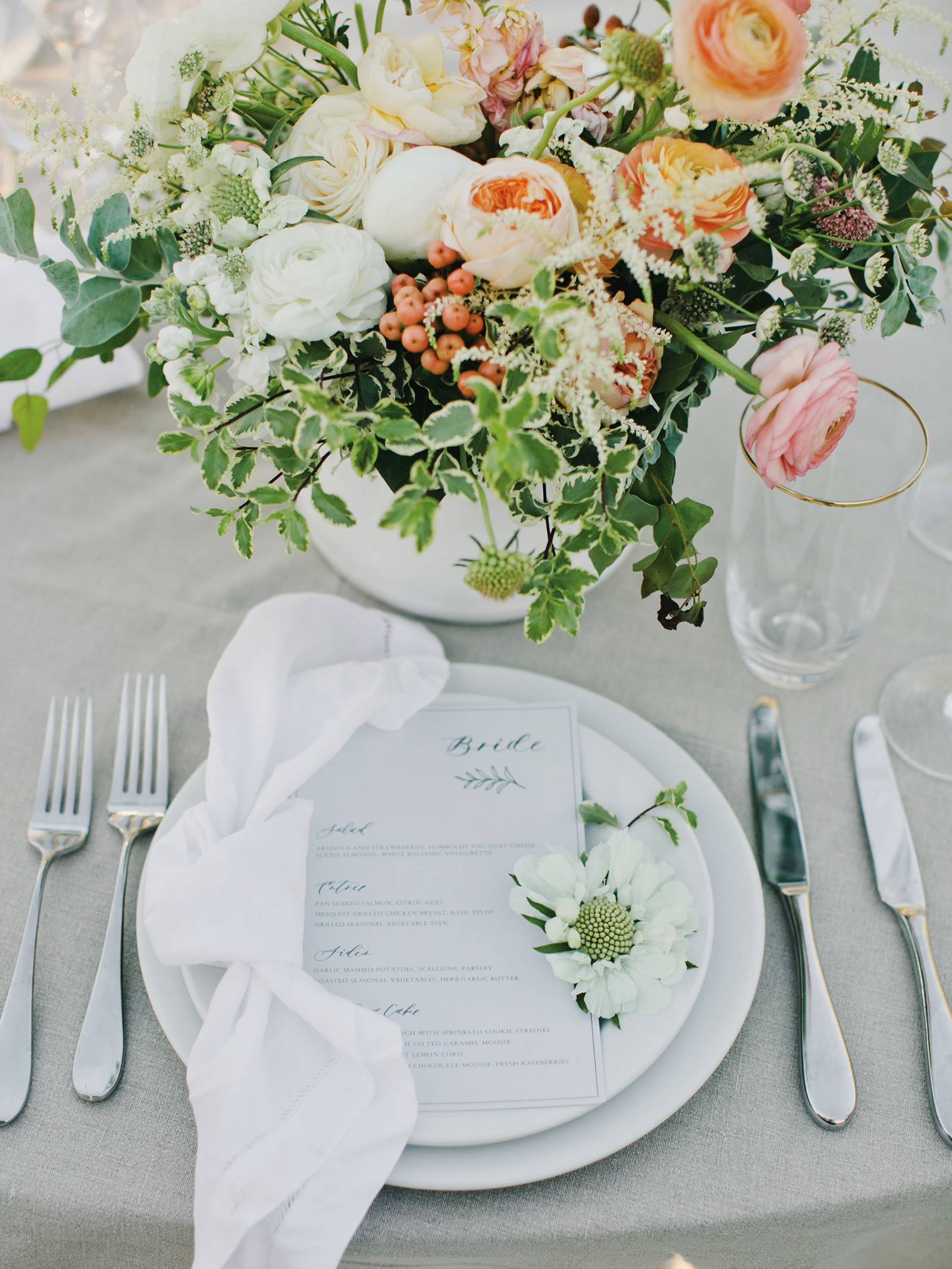 white, coral and spring green place setting