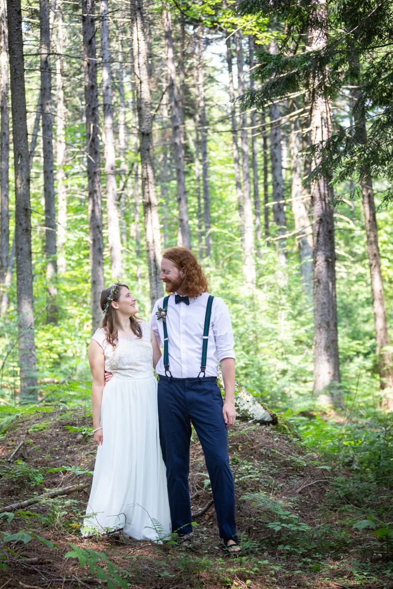 bride and groom portraits in woods in the summer