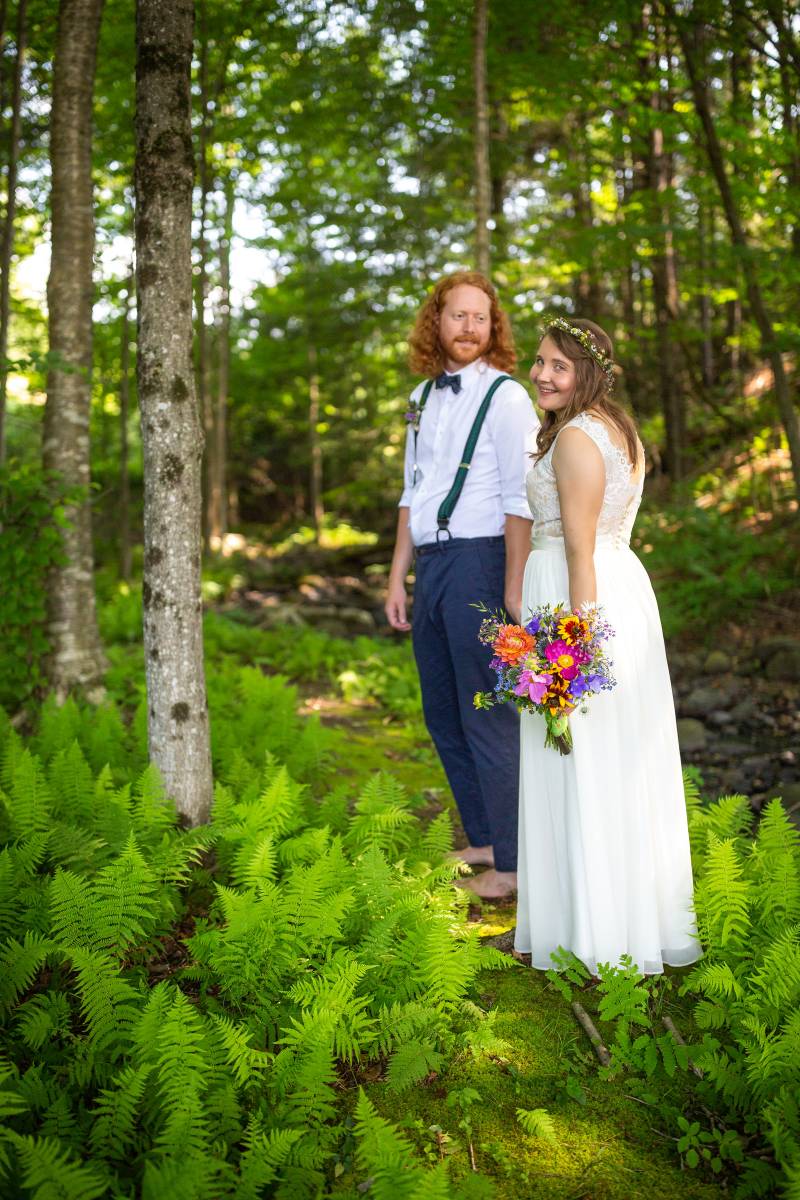couple wedding portraits in wood in the summer