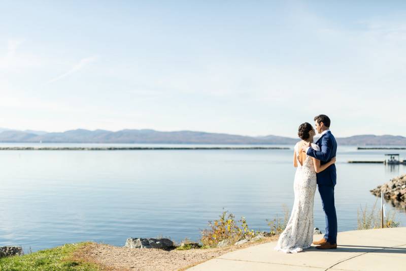 Couple embraces for first look photos on Lake Champlain