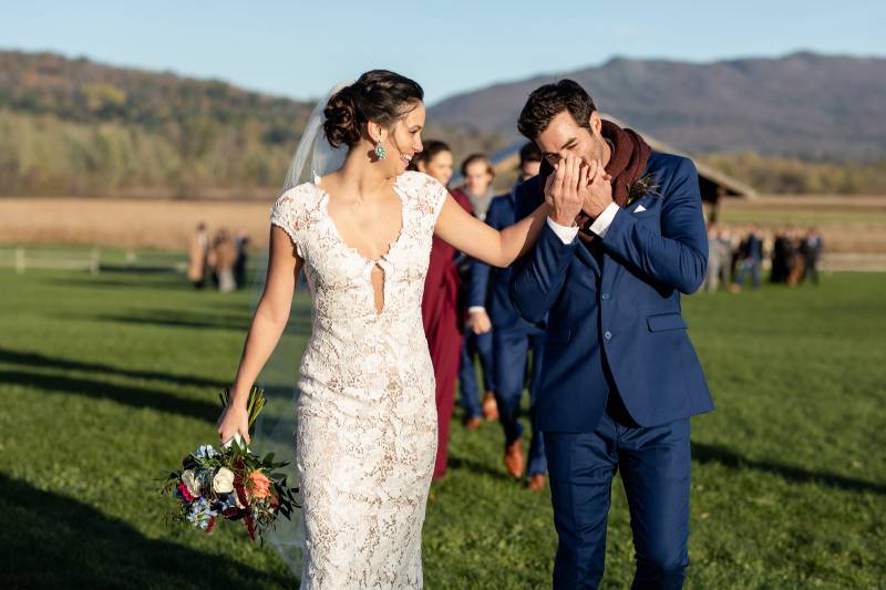 Bride and groom laughing after ceremony at Boyden Barn during fall wedding