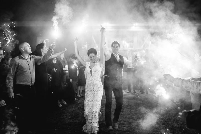 Bride and groom sparkler exit from fall wedding at Boyden Barn