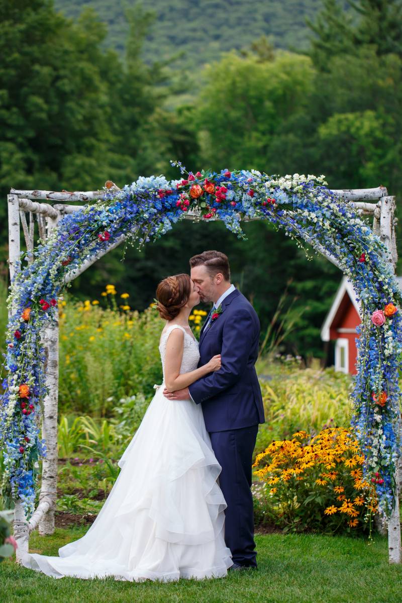 Blue floral ceremony arch drapery decor inspiration