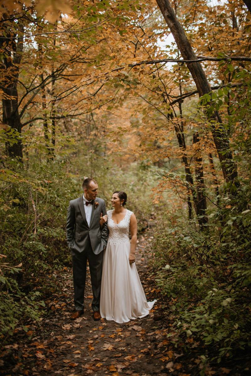 Bride and groom portrait on wedding day in Vermont woods