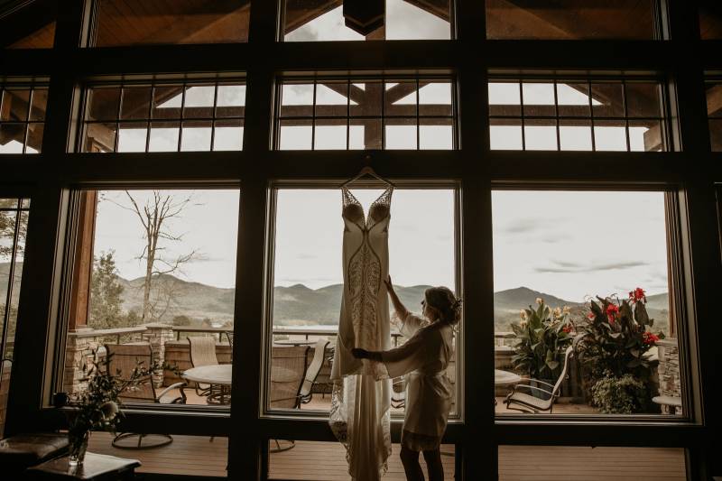 Bride admiring dress in window at the Mountain Top Inn