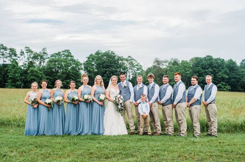 Blue and khaki wedding party for outdoor summer rustic romantic wedding