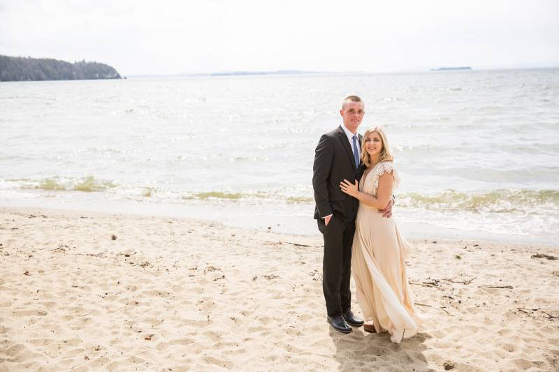 Couple posing on Leddy Beach on Lake Champlain in Burlington Vermont during spring elopement