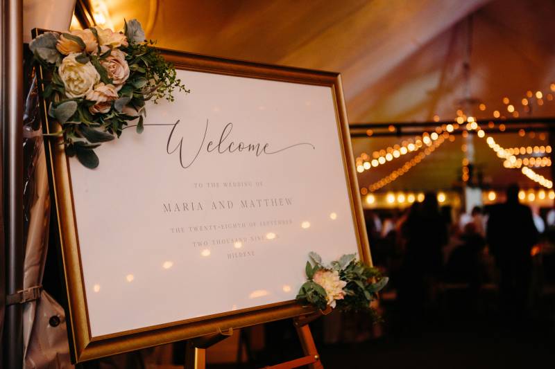 Welcome sign at black tie tent wedding at Hildene in fall