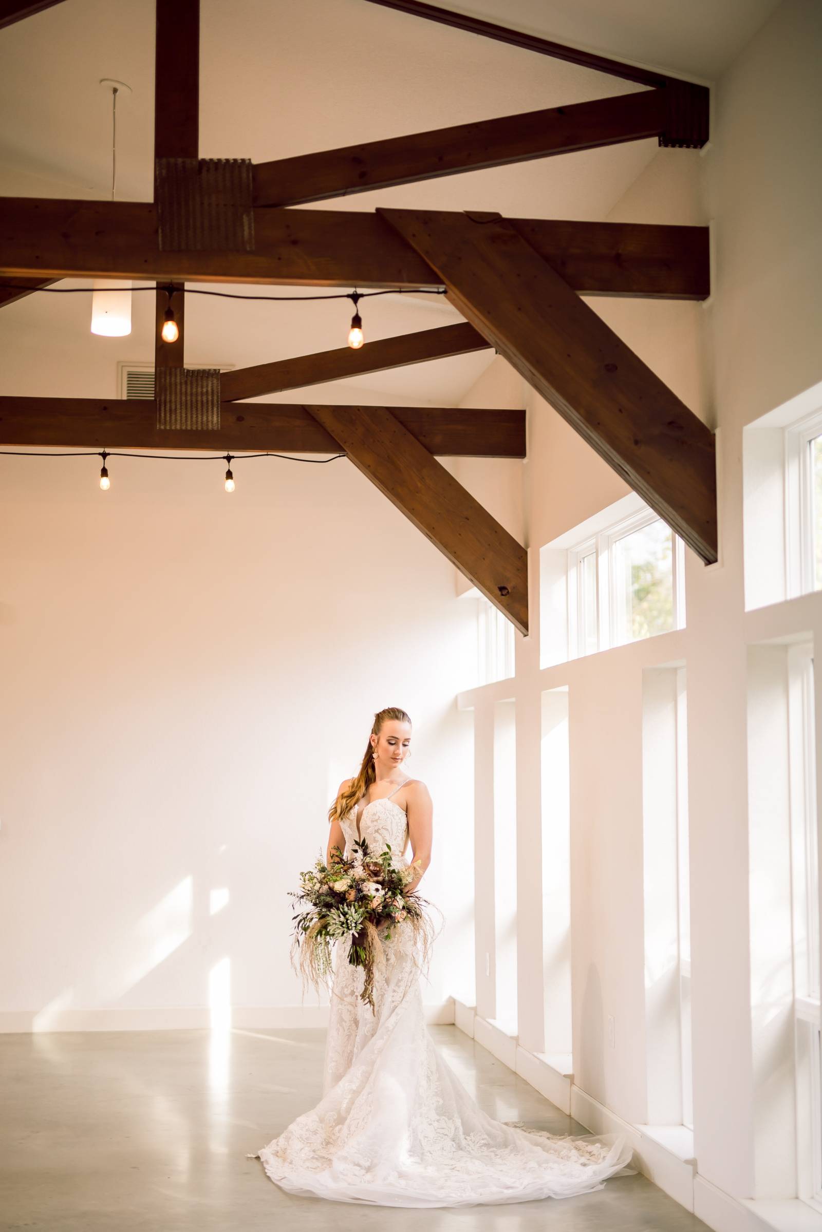 White wedding venue with exposed beams