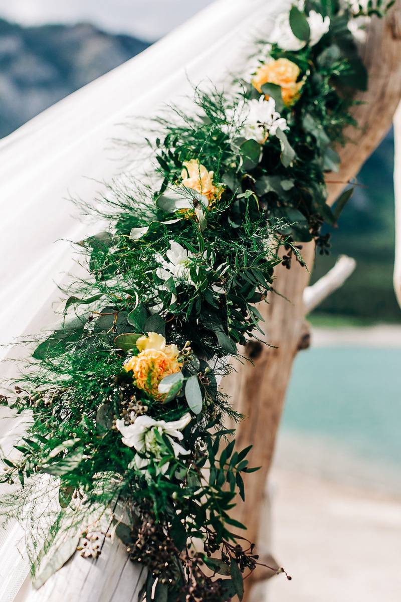 Mountain wedding flowers with pops of yellow