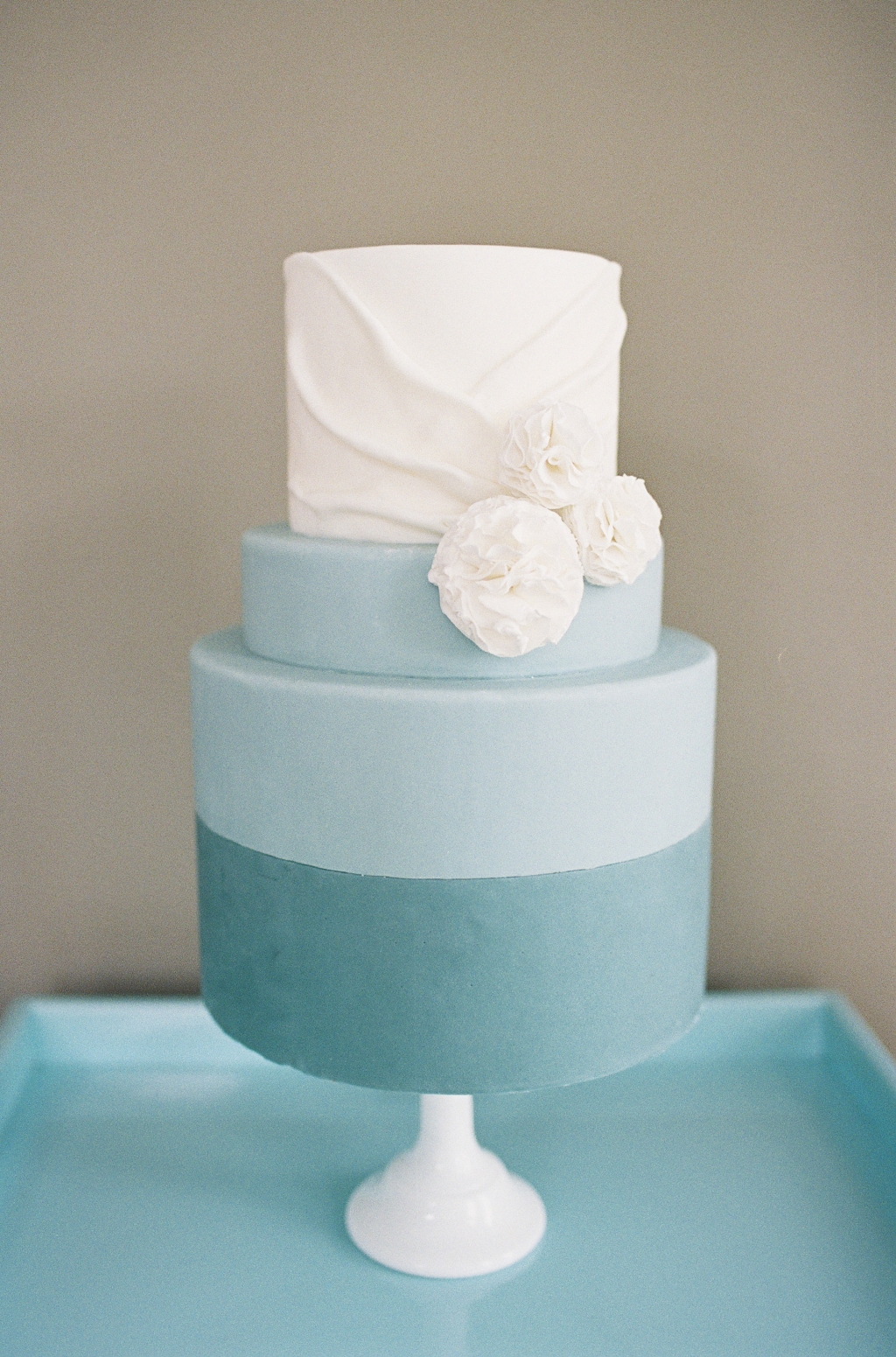 Turquoise and white wedding cake