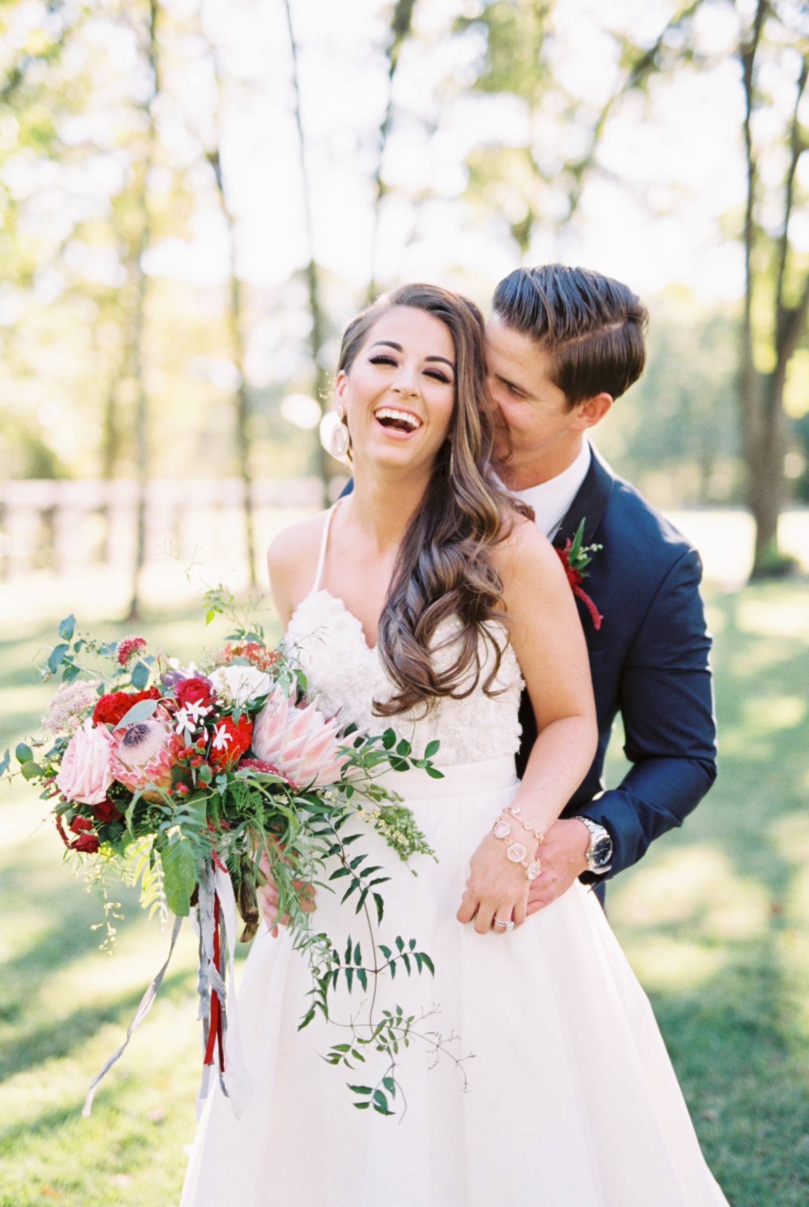 Winter Wedding in Texas with pops of pomegranate red | Texas Real Weddings