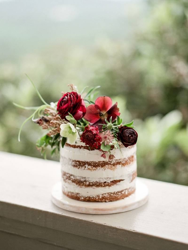 Naked cake with red flowers