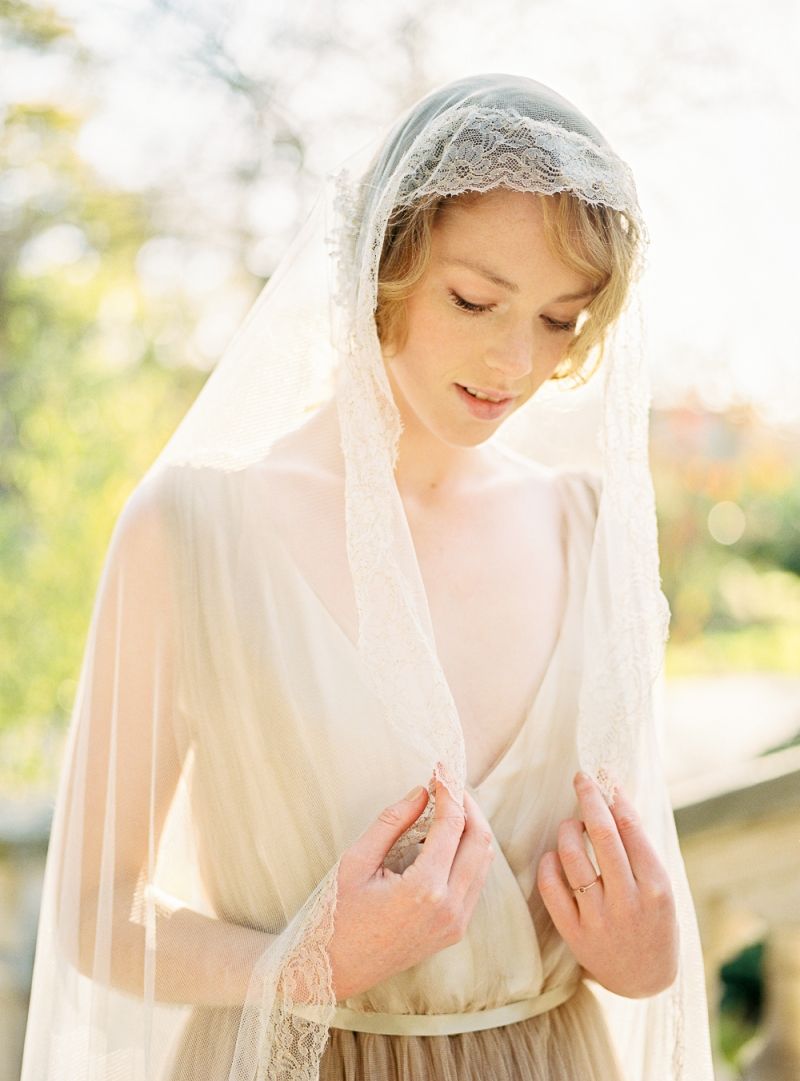 Bride in lace edge veil