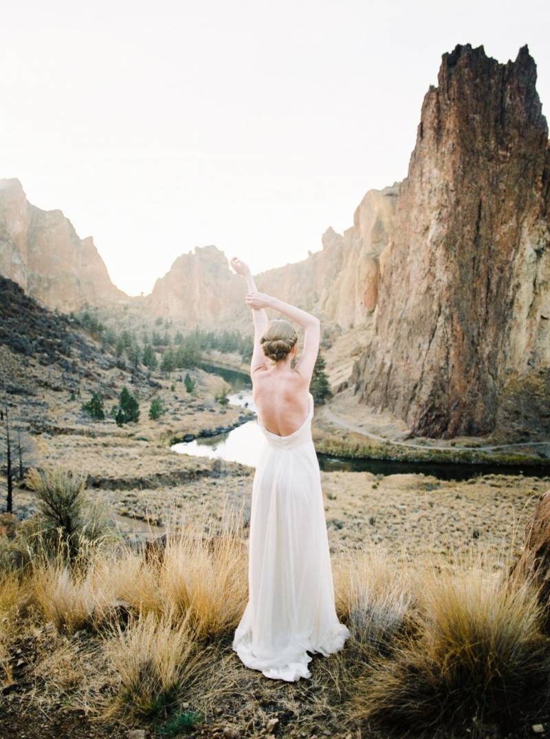 Bride in dramatic landscape