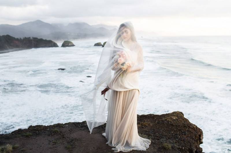 Moody bride on the cliffs
