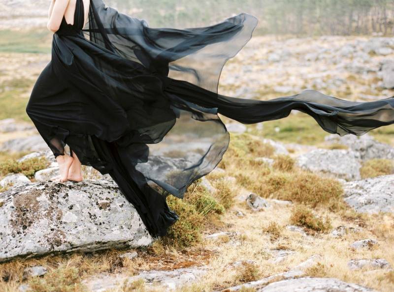 Black dress in wind