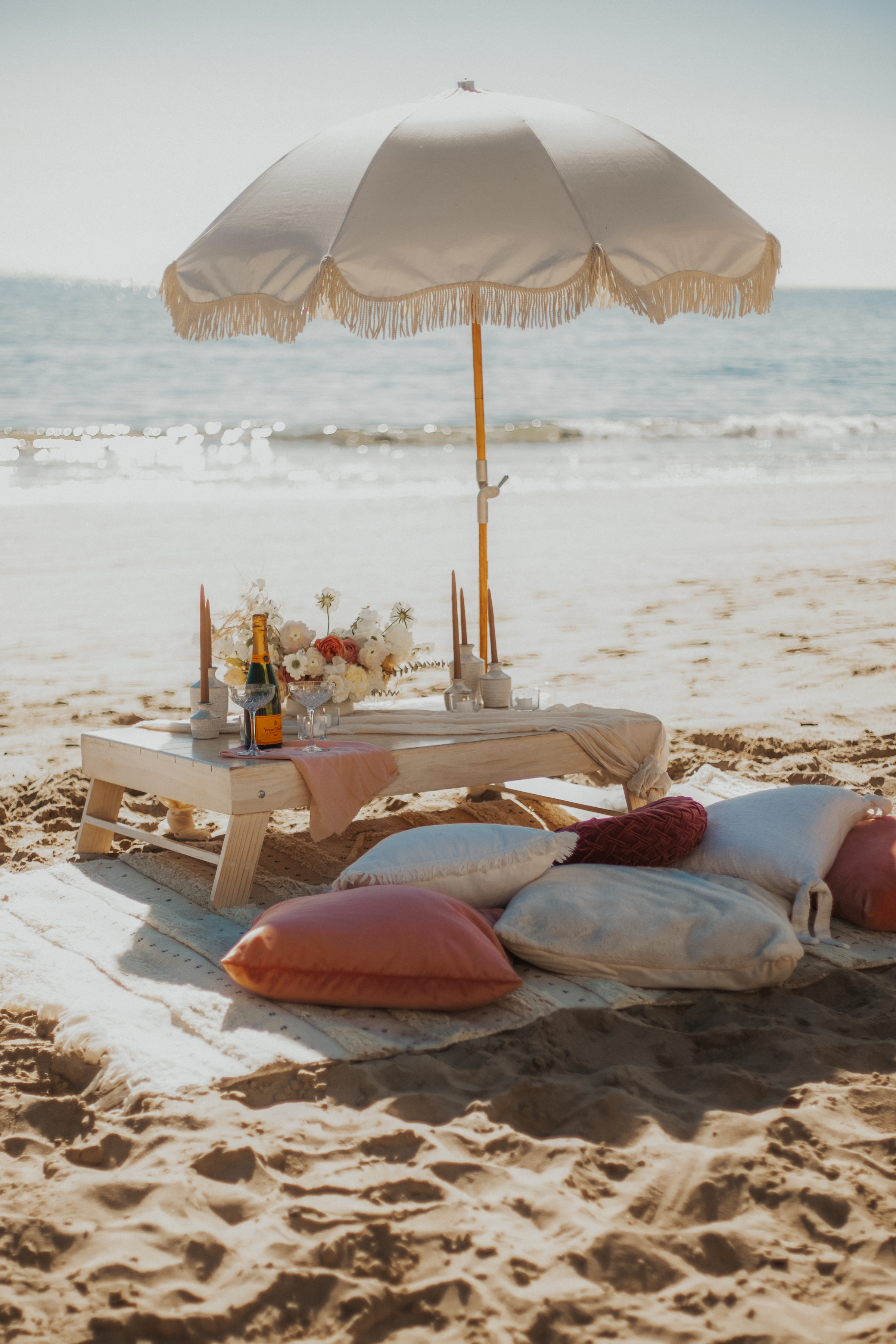 picnic, flowers, beach, candles, votives, Champagne, pillows