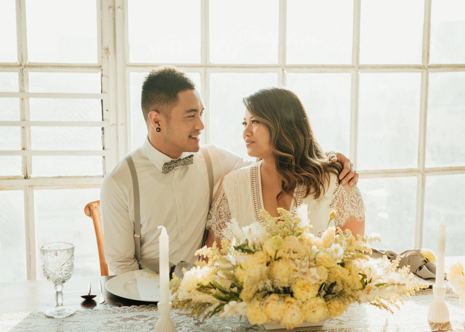 couple, bride, groom, table, flowers, loft