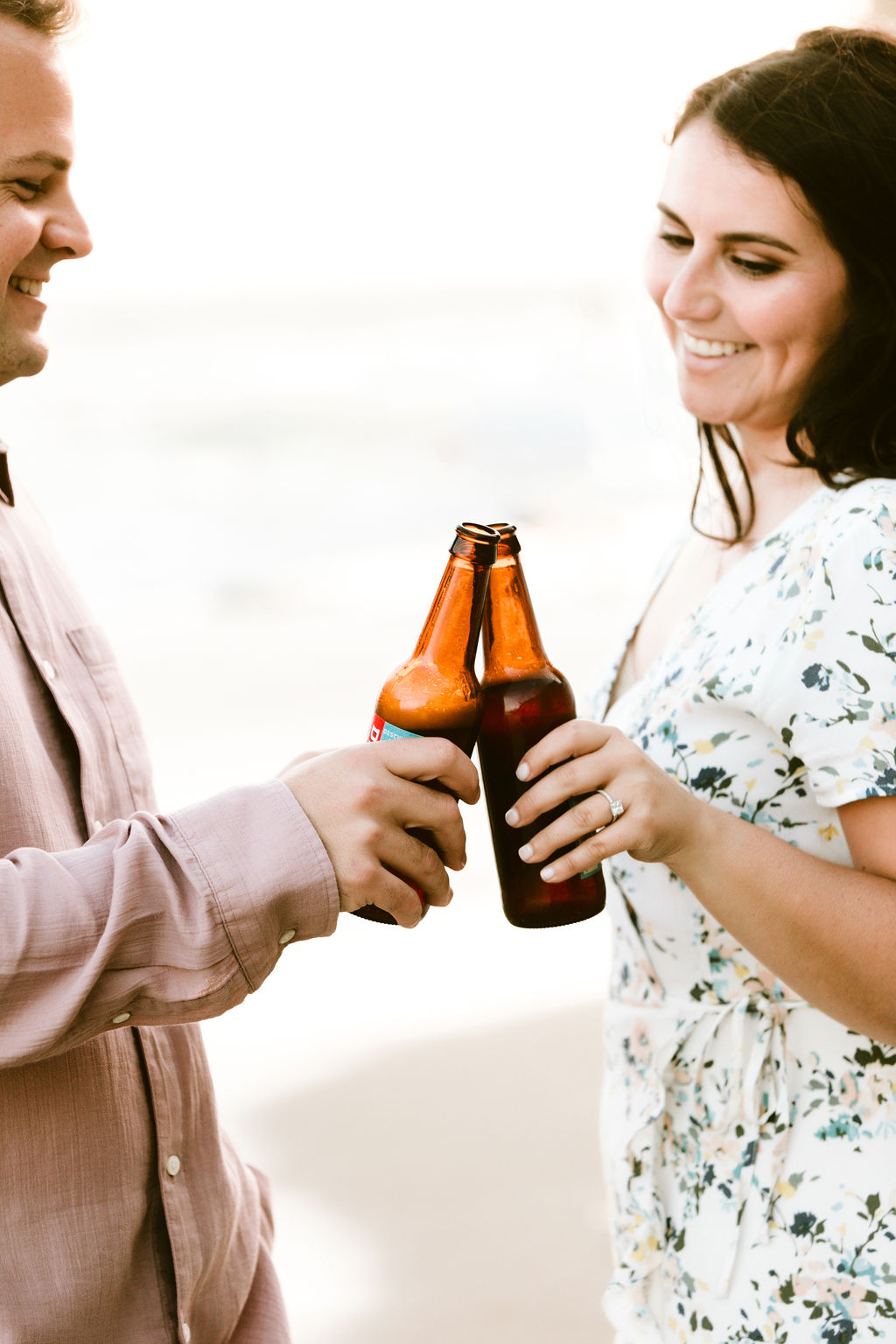 engagement, beach, beer, cheers