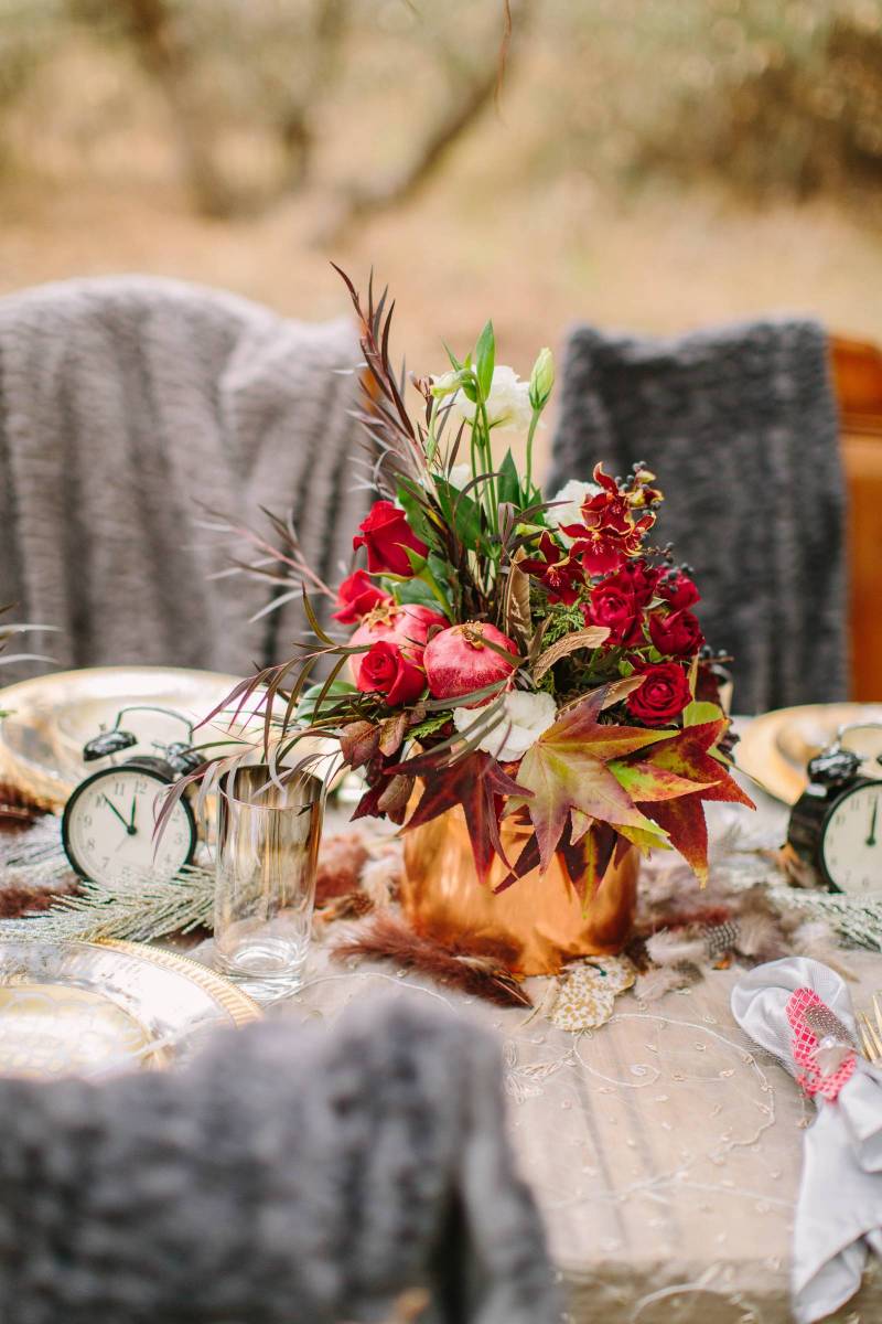The Table Beautifully Decorated With the Flowers Placed in Center | The Wedding Standard