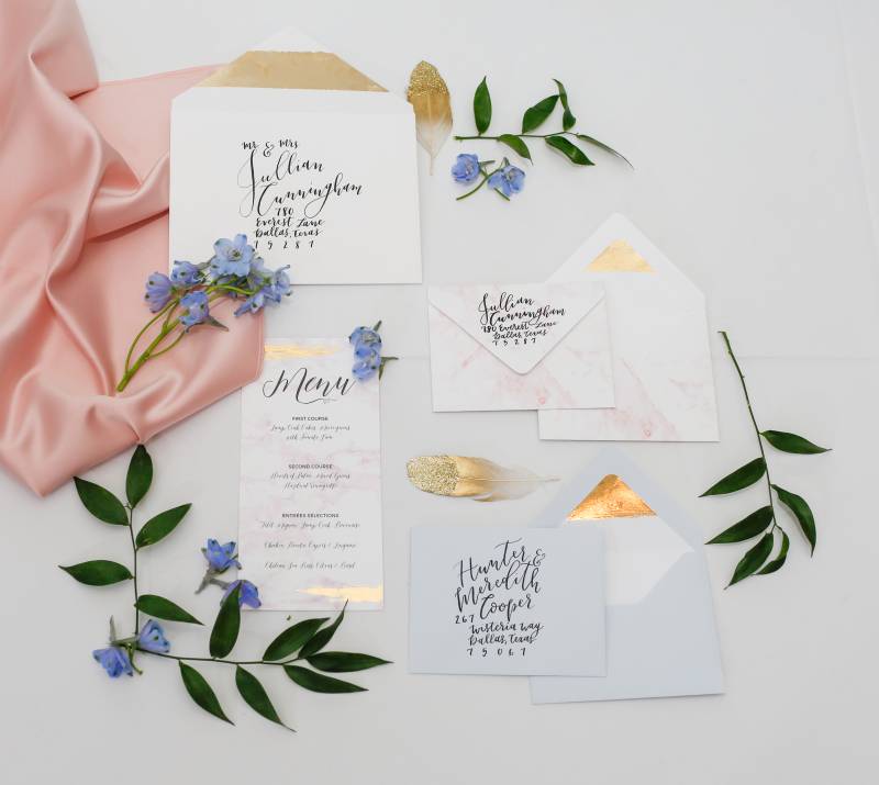 White, gold, and black wedding invitation