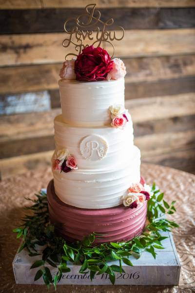 Cream and burgundy buttercream wedding cake