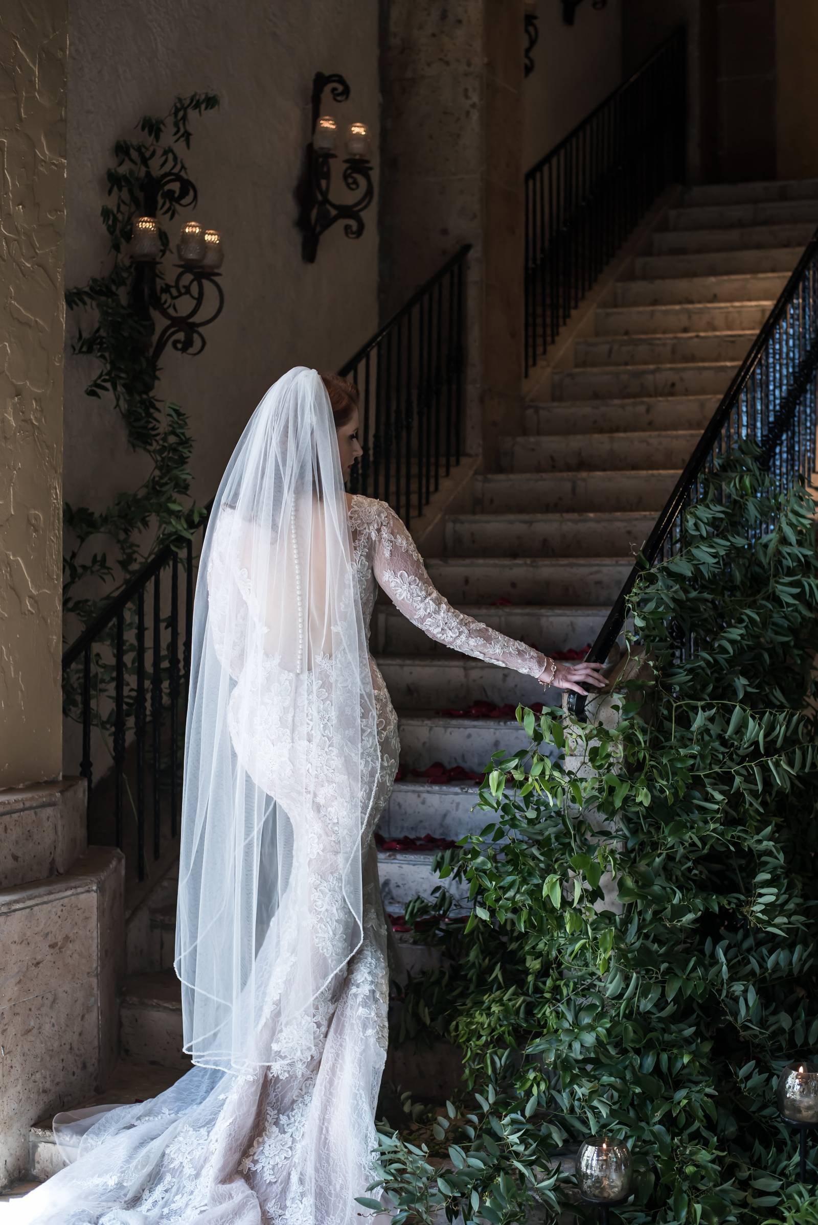 Long-sleeved lace wedding dress with veil