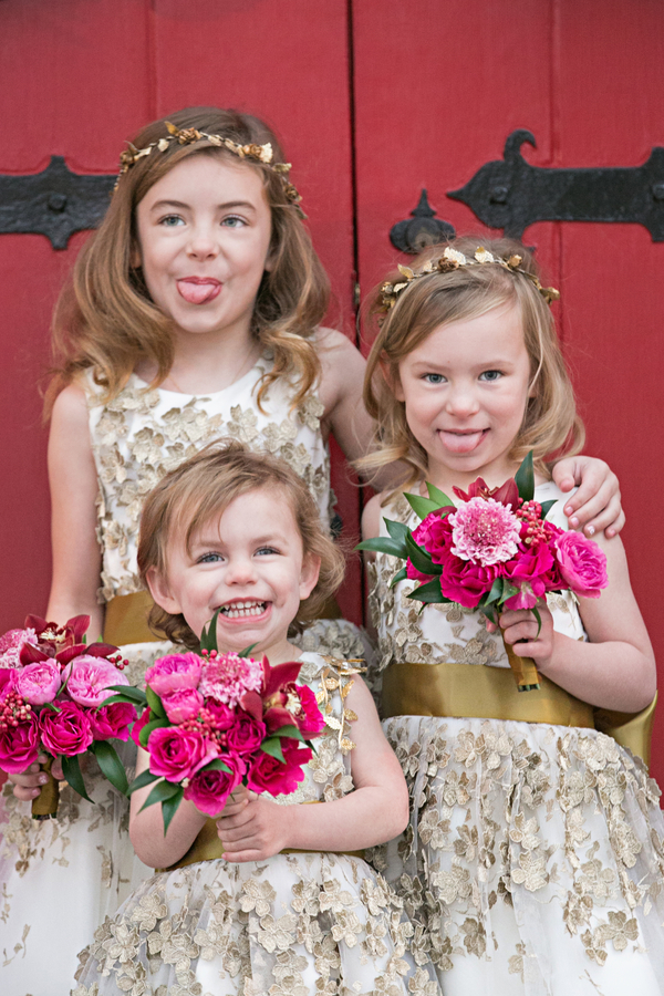 Flower girls with pink wedding bouquets