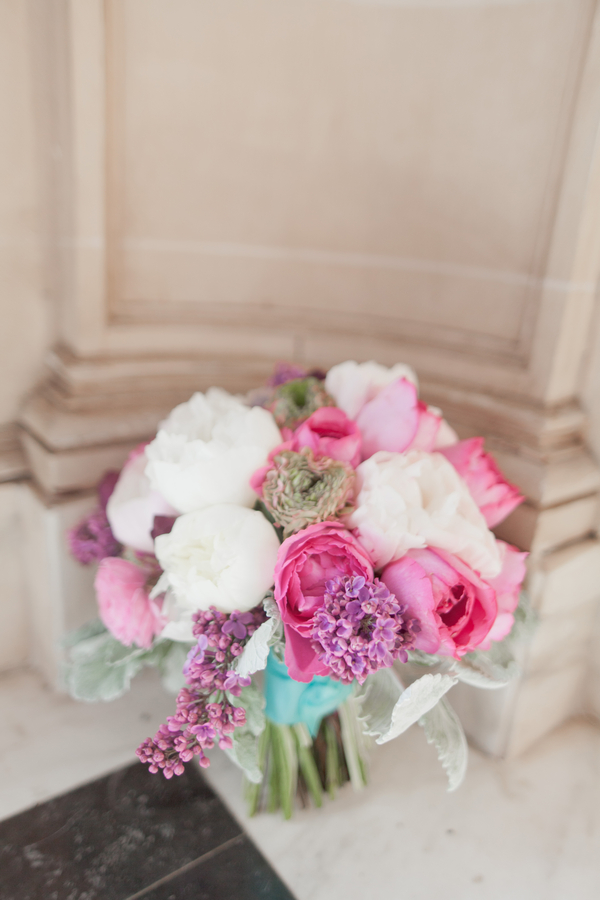 Cream. pink, and purple wedding bouquet
