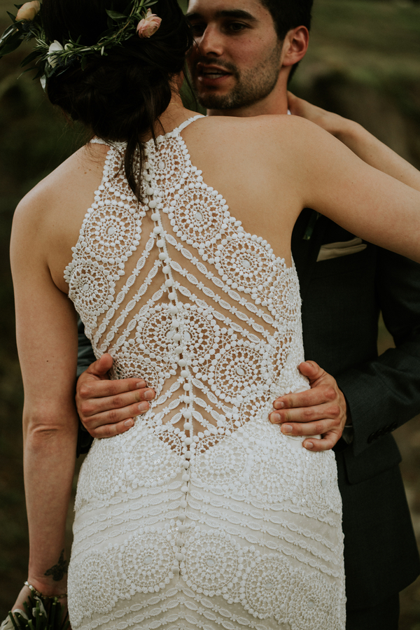 See through back on lace wedding dress