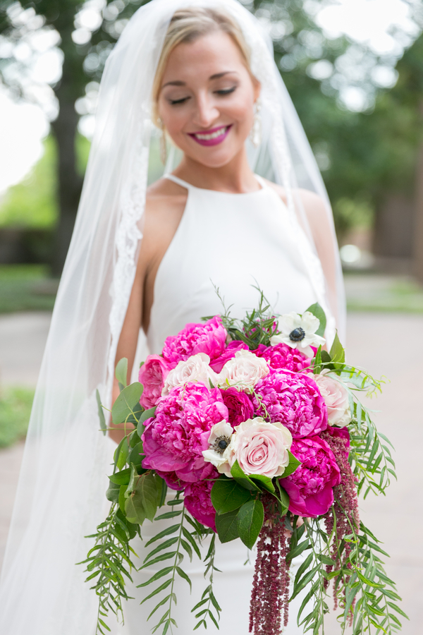Bride with pink wedding bouquet