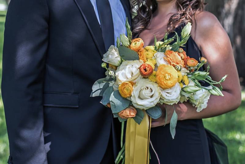 Yellow, orange, and cream wedding bouquet
