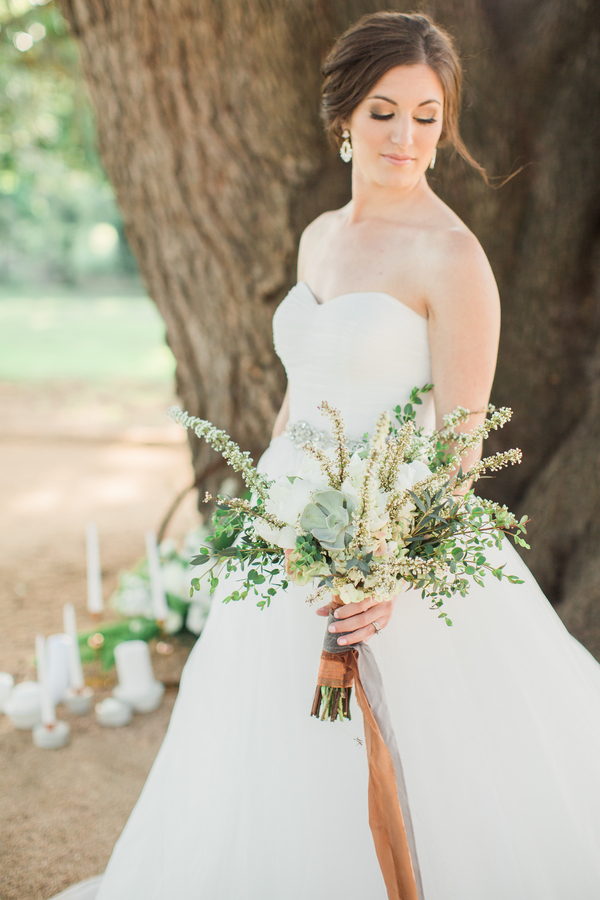 Beautiful bride with organic bouquet