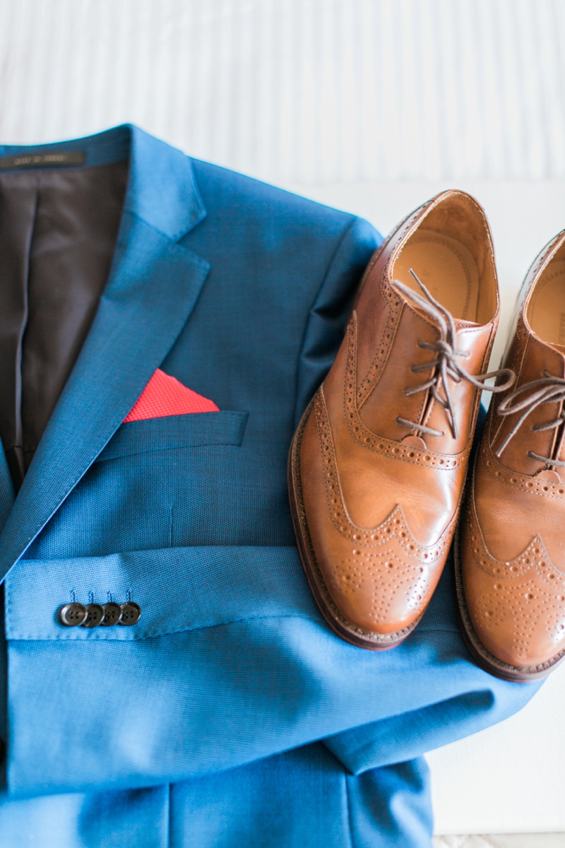 Blue sports jacket and brown groom's shoes