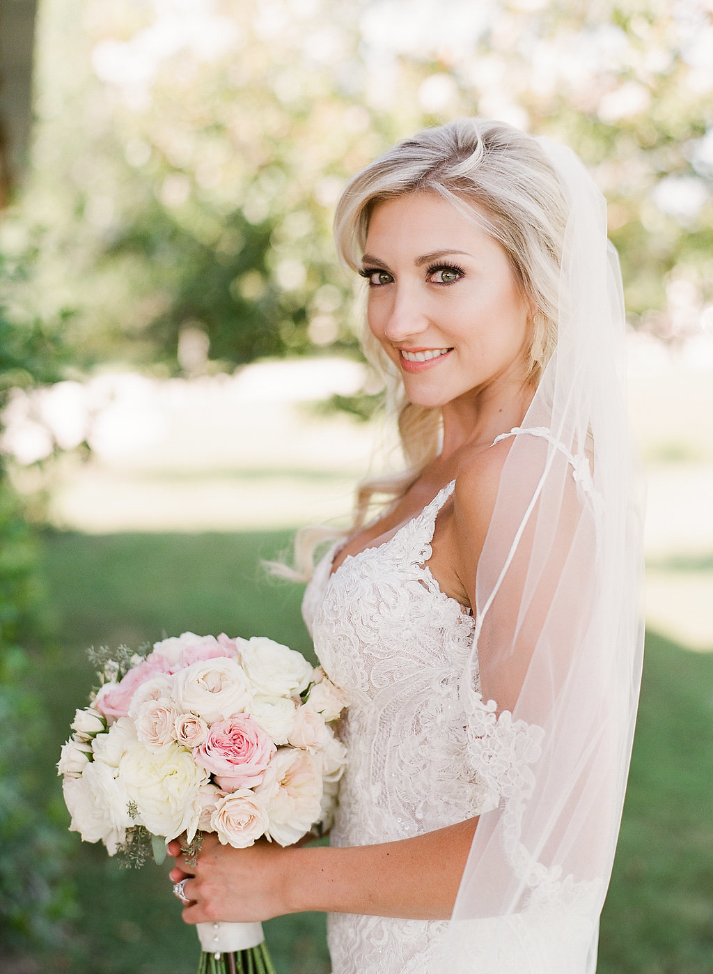 Beautiful bridal portrait with pink bridal bouquet