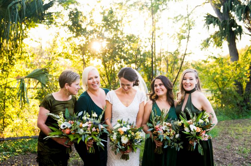 Green bridesmaid dresses and bouquets