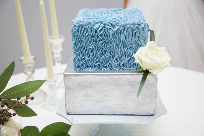 silver and blue wedding cake
