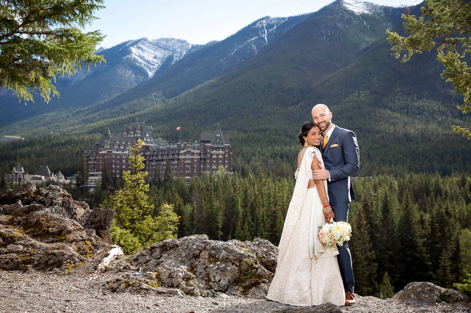 Bride and groom at surprise corner in Banff, Fairmont Banff Springs hotel