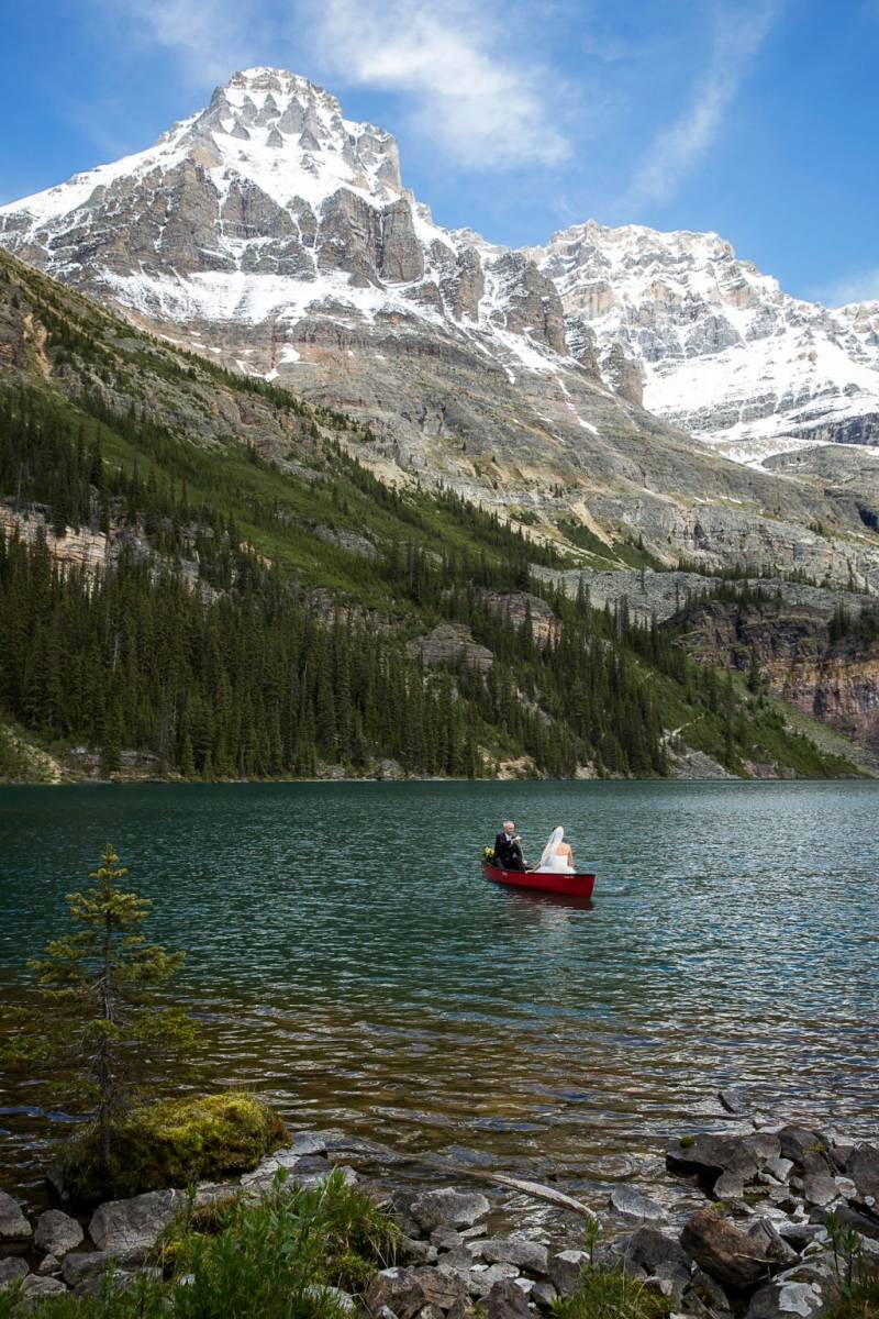 Lake O'Hara Wedding, Banff Wedding Photographer, Bride and groom in a canoe, Mountain Wedding