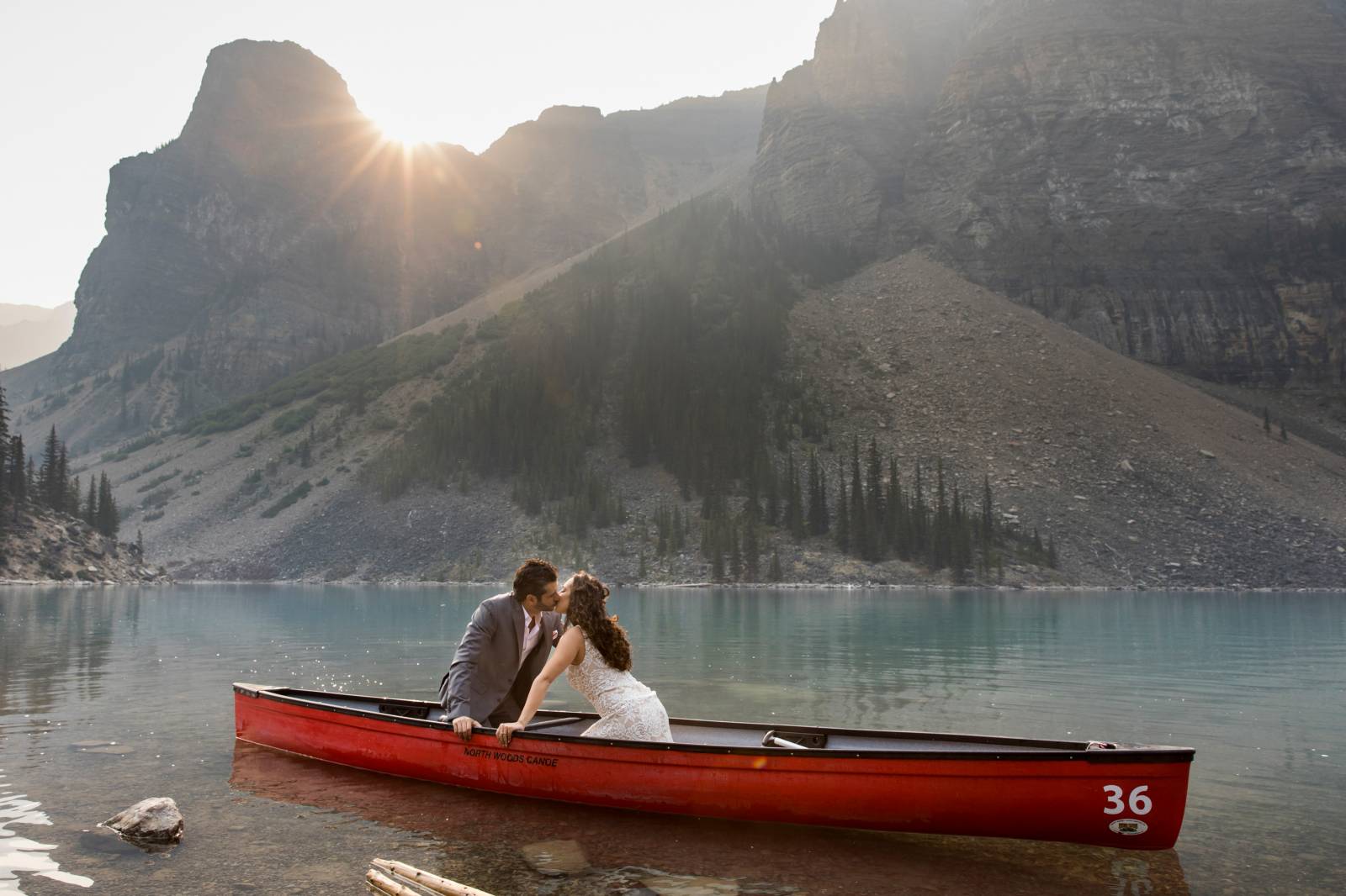 Canoe engagement photos, Moraine Lake Engagement photos in a canoe, Sunrise Mountain Photo session, 