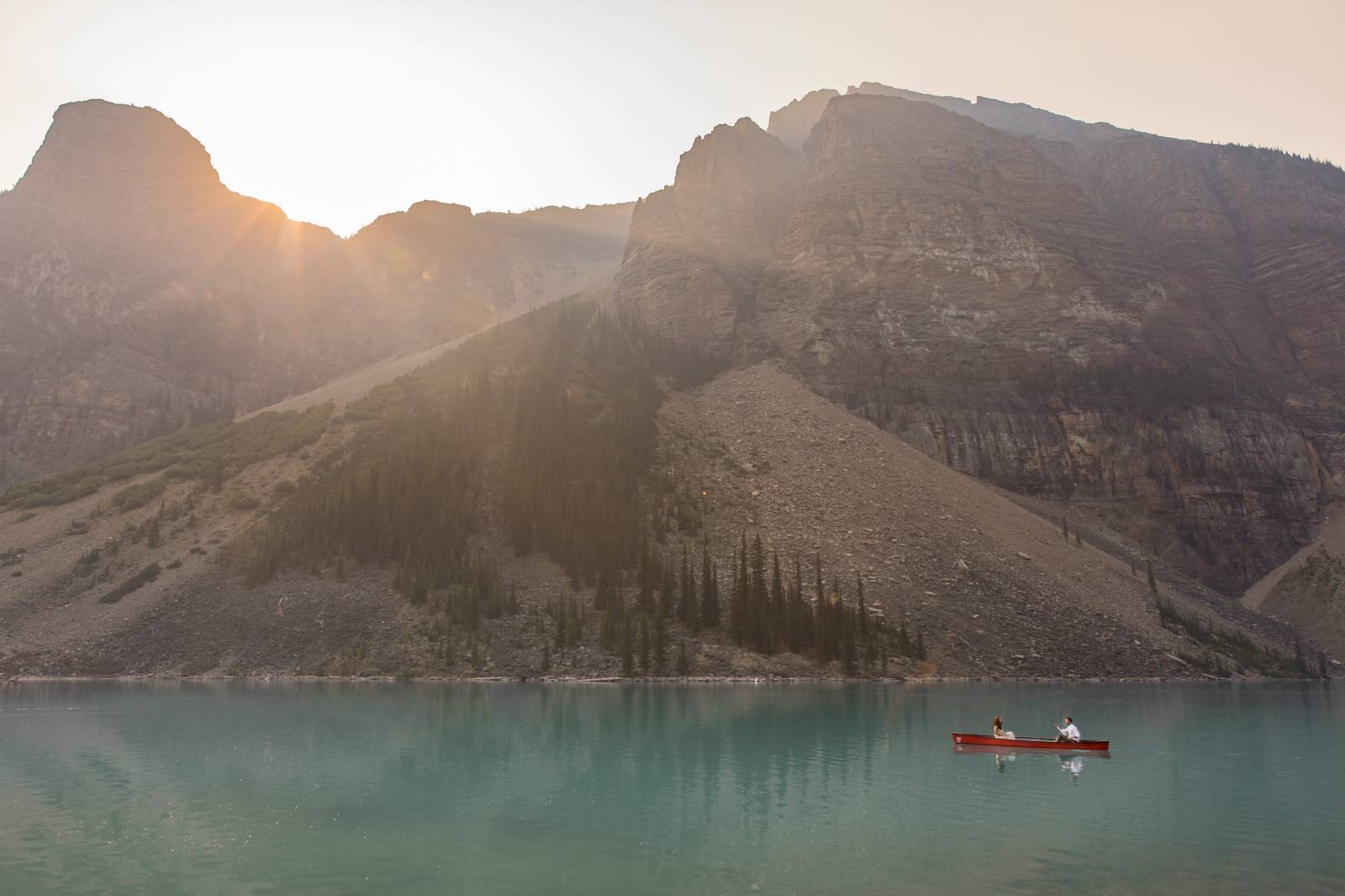 Canoe engagement photos, Moraine Lake Engagement photos in a canoe, Sunrise Mountain Photo session, 