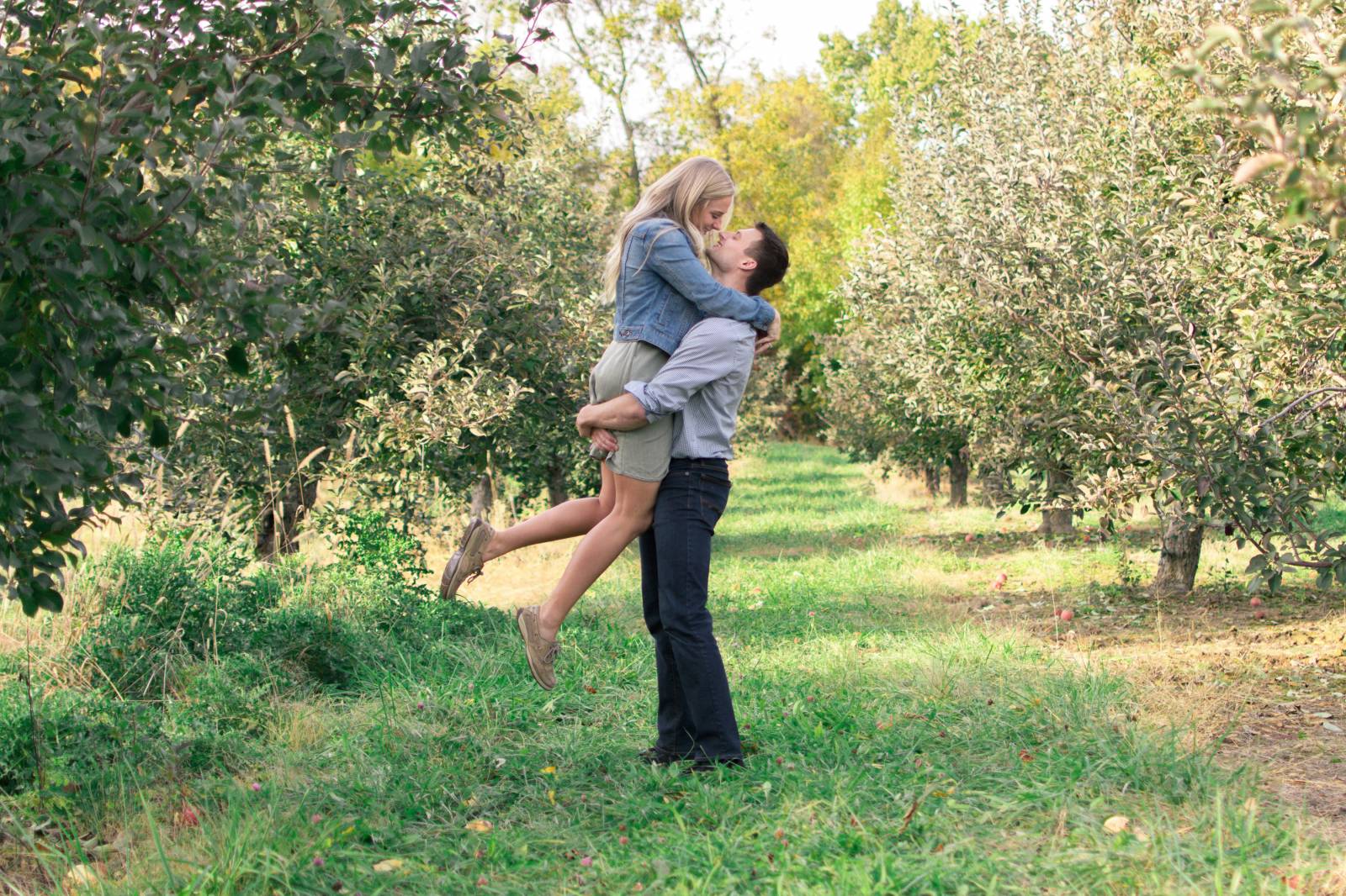 lifted romantic engagement photo