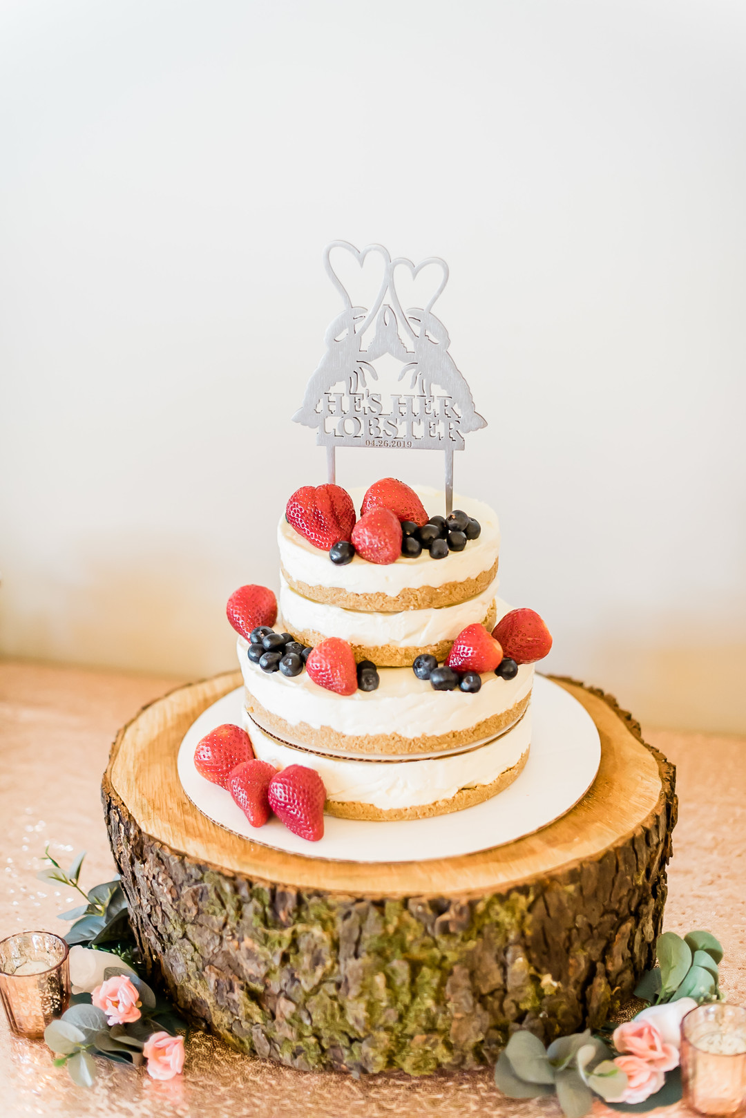 two-tiered fruit covered wedding cake